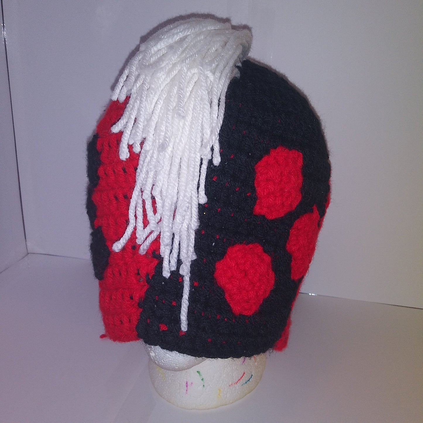 Harley Quinn Crochet Mohawk Beanie Cosplay headwear Red & Black Crochet Headpiece Front 3/4th view